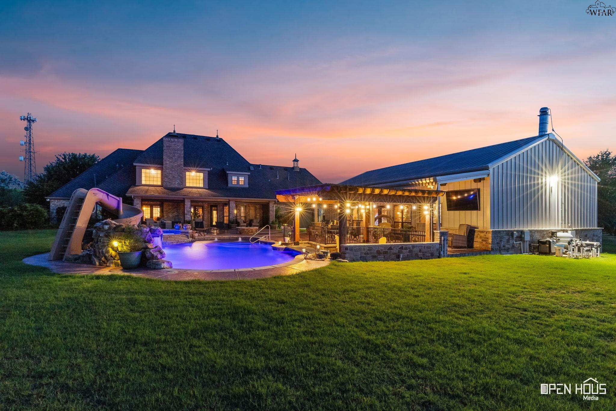 Estate and saltwater pool at twilight