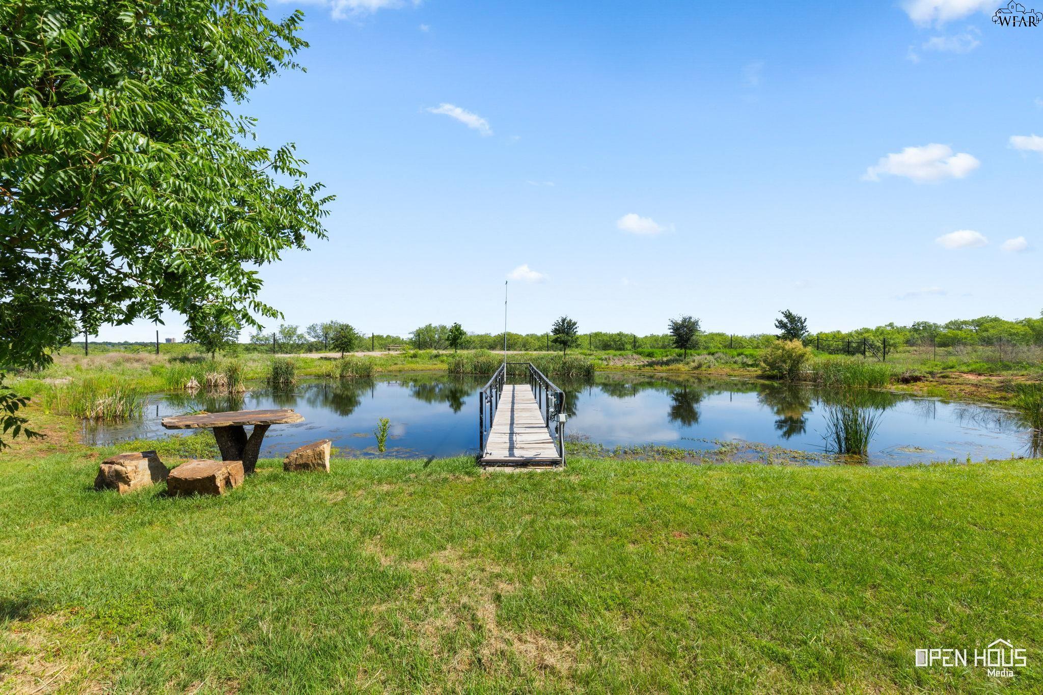 Stocked pond with fountain
